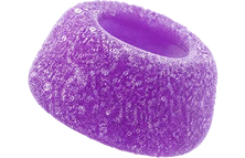 A single purple, sugar-coated ring-shaped candy, likely a grape soda pop candy, isolated on a white background.