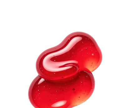 Two glossy, translucent red gel beads with tiny embedded bubbles, shown on a solid white background.