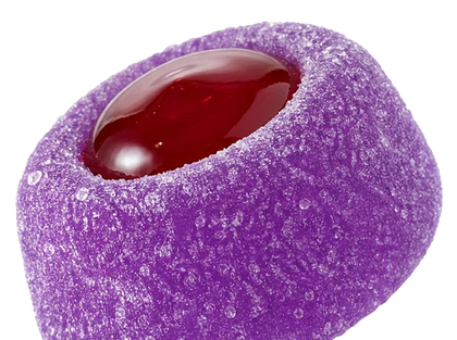 A close-up of a purple, sugar-coated candy or confection with a glossy red center, isolated on a white background.